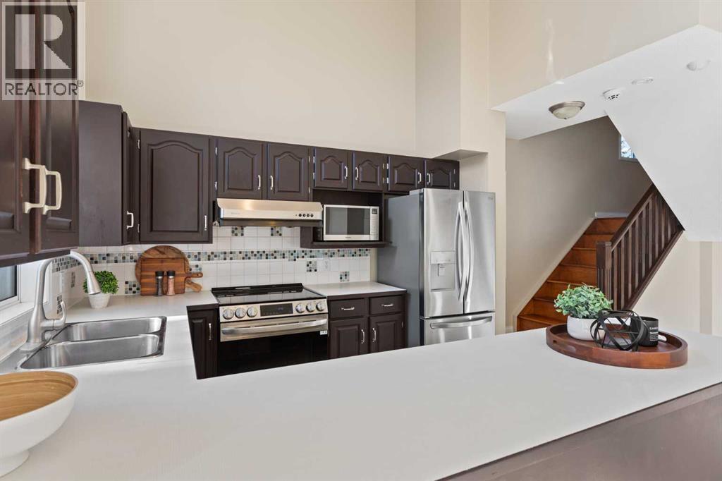 Single Family House 4 Level for Sale in  Kingsland Villas SW Kingsland Calgary 
