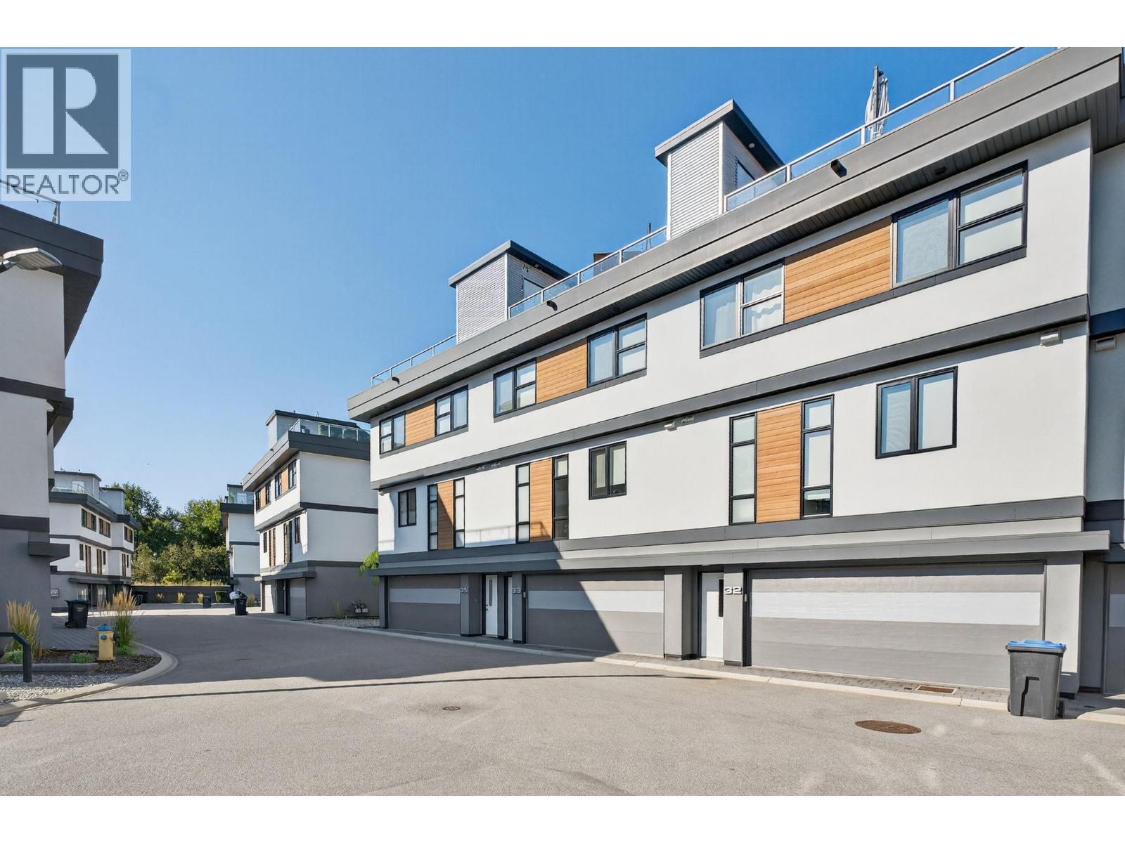 1515 Highland Drive, Kelowna - Exteriors - Full Complex View - Photo 7