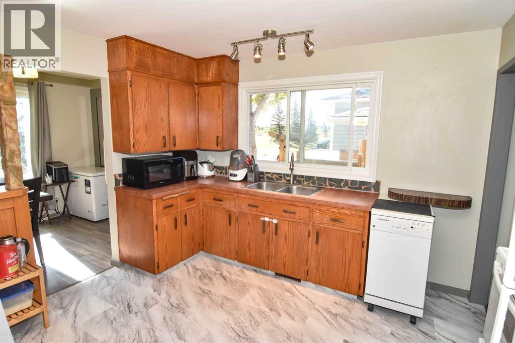 Single Family House Bungalow for Sale in  Woodvale Road SW Woodlands Calgary 