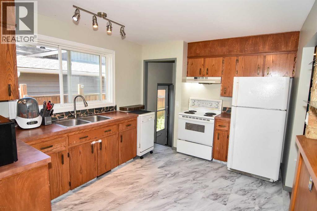 Single Family House Bungalow for Sale in  Woodvale Road SW Woodlands Calgary 