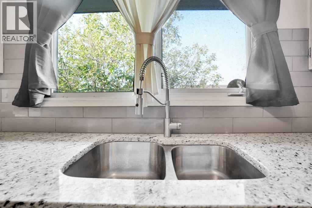 Single Family House Bi-level for Sale in  Rundlewood Drive NE Rundle Calgary 