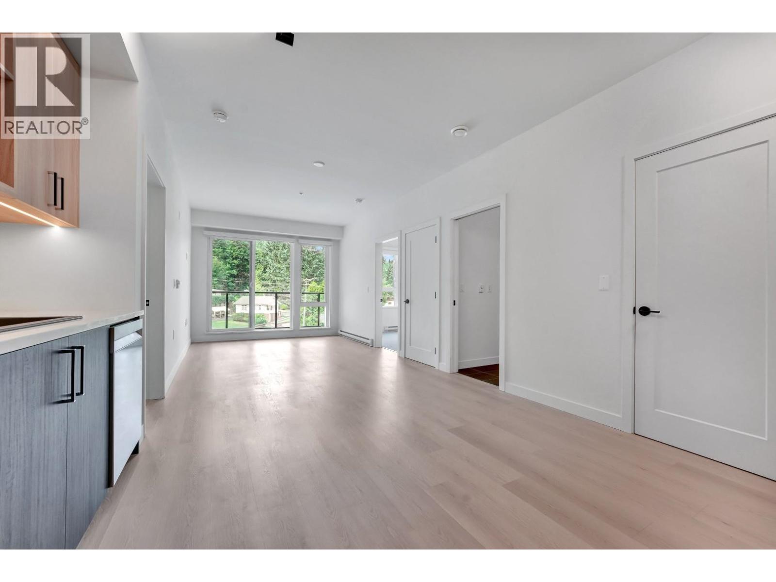 304 1100 CLARKE ROAD, Port Moody