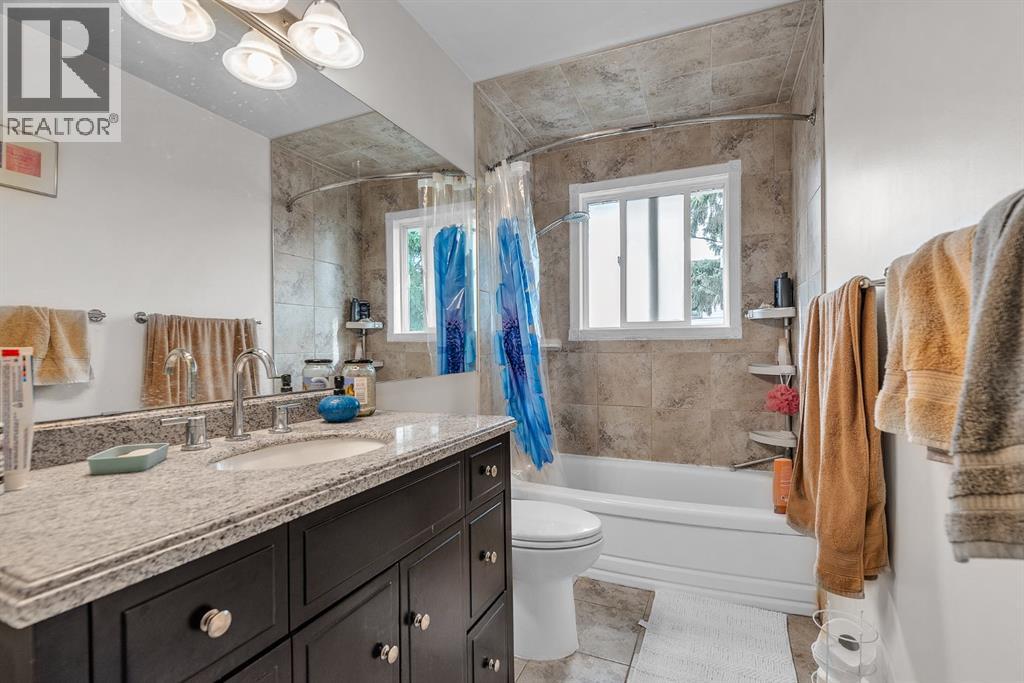 Single Family House Bi-level for Sale in  Athens Road SE Acadia Calgary 