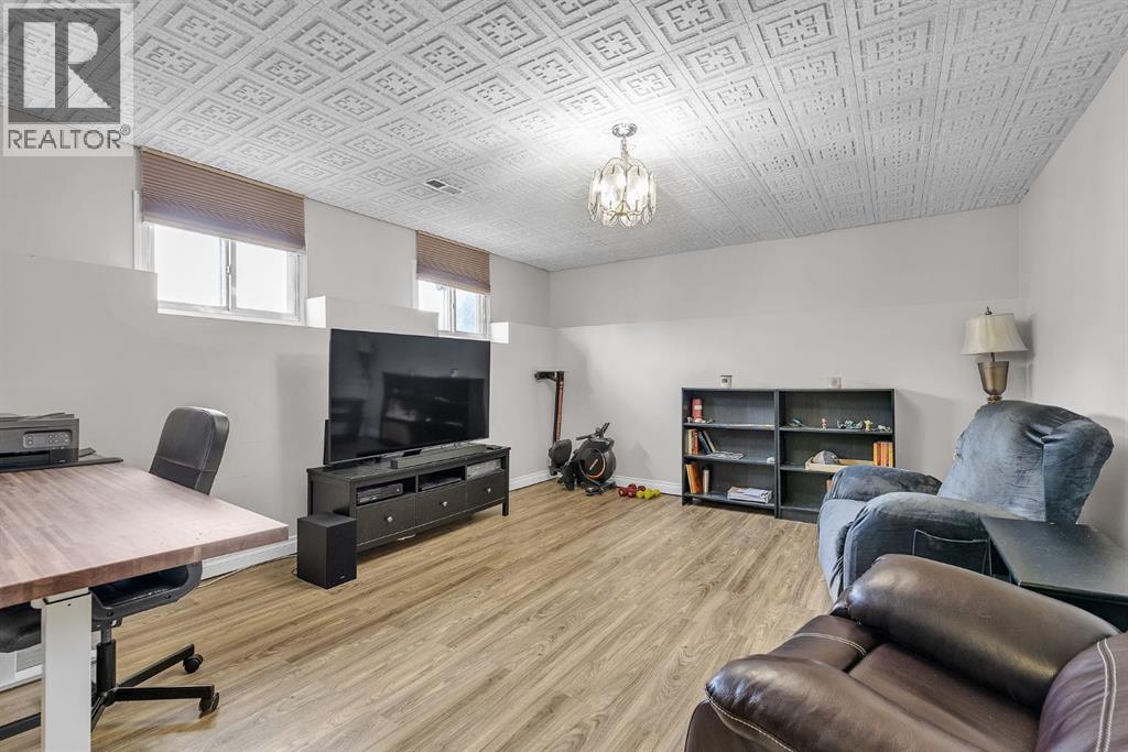 Single Family House Bi-level for Sale in  Athens Road SE Acadia Calgary 