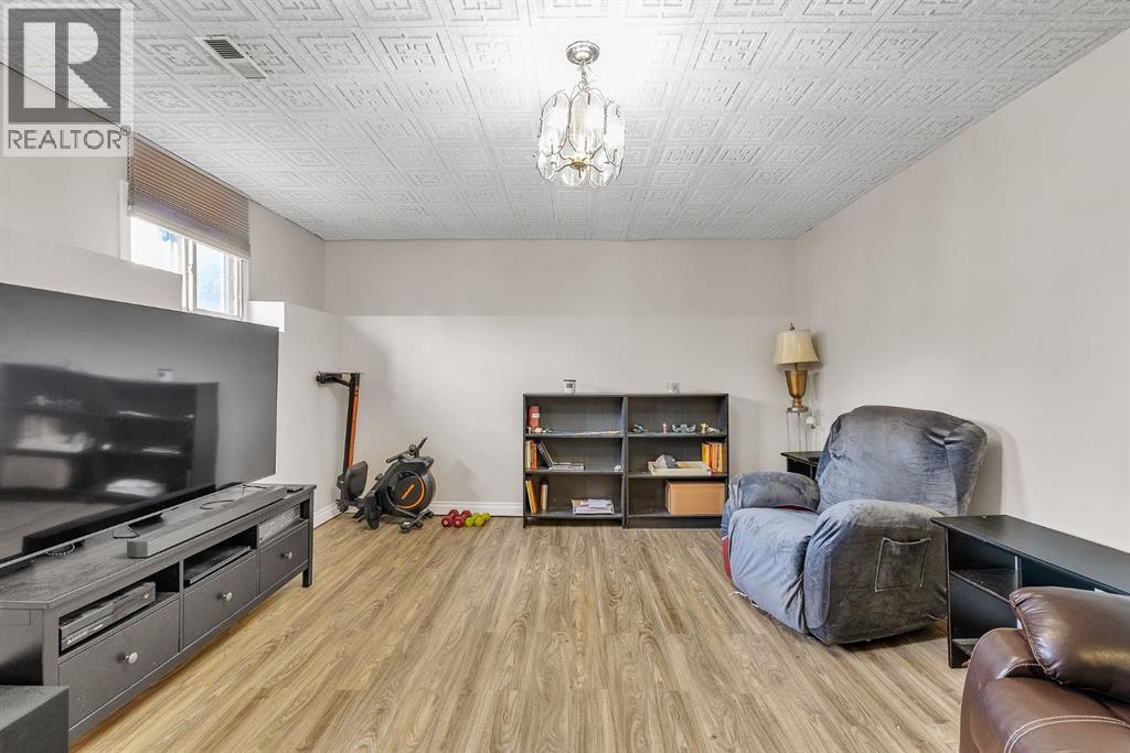 Single Family House Bi-level for Sale in  Athens Road SE Acadia Calgary 