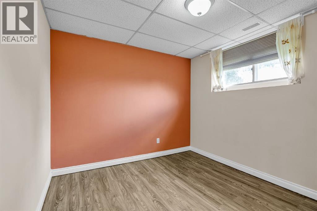 Single Family House Bi-level for Sale in  Athens Road SE Acadia Calgary 