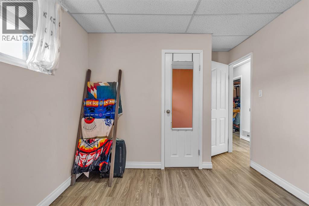 Single Family House Bi-level for Sale in  Athens Road SE Acadia Calgary 