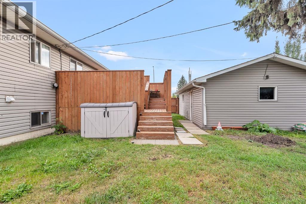 Single Family House Bi-level for Sale in  Athens Road SE Acadia Calgary 