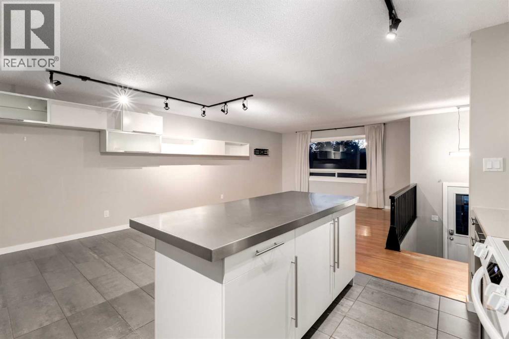 Single Family House Bi-level for Sale in  ALCOTT Road SE Acadia Calgary 