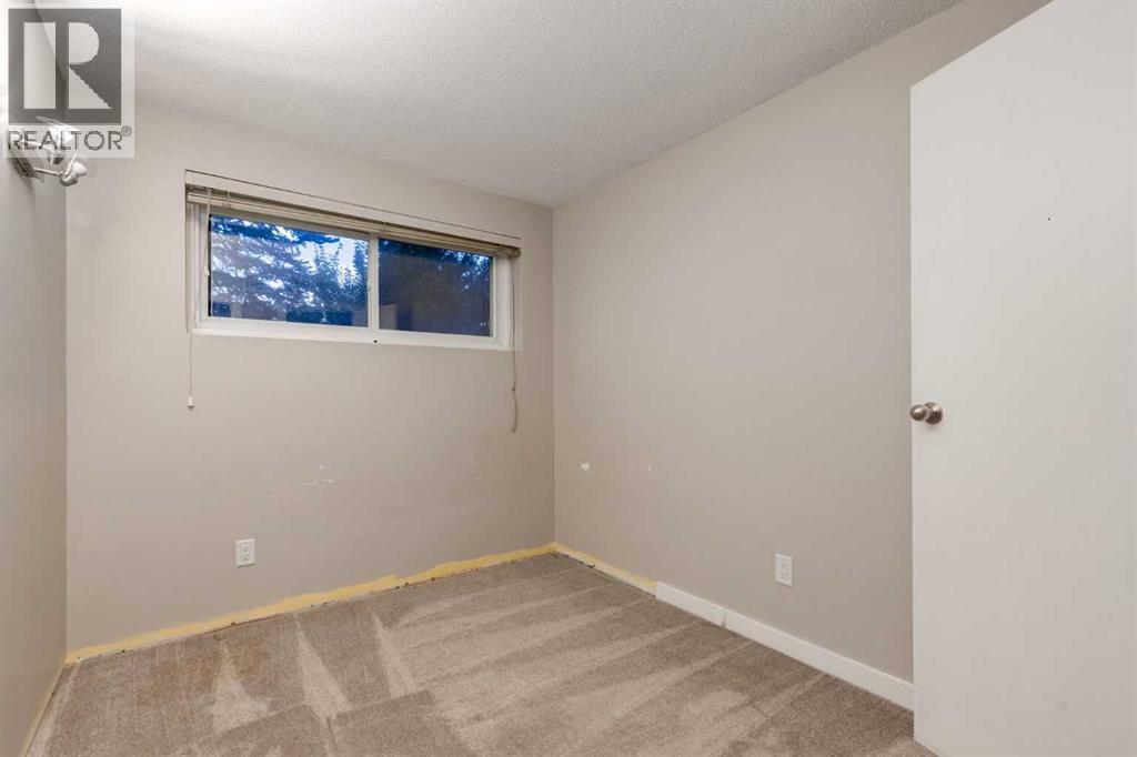 Single Family House Bi-level for Sale in  ALCOTT Road SE Acadia Calgary 