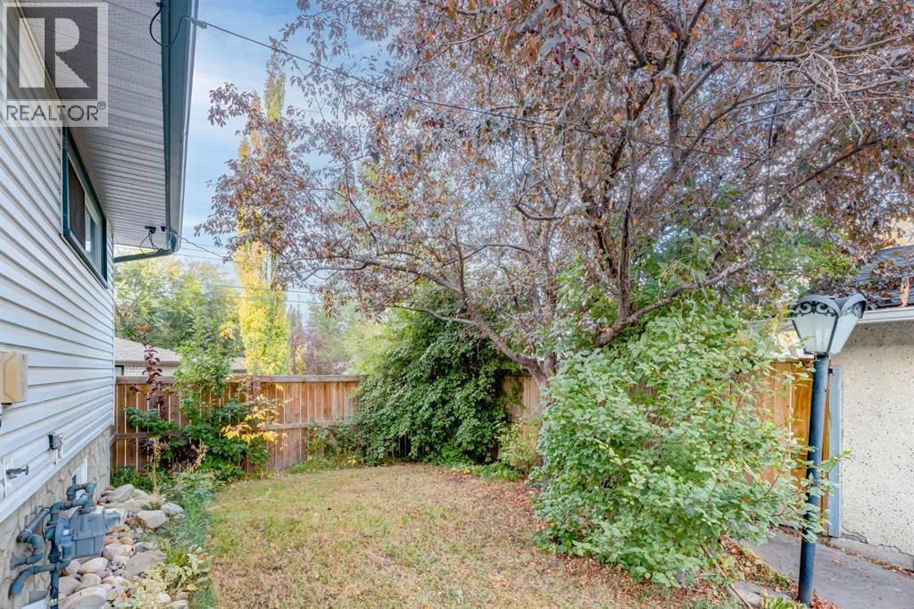 Single Family House Bi-level for Sale in  ALCOTT Road SE Acadia Calgary 