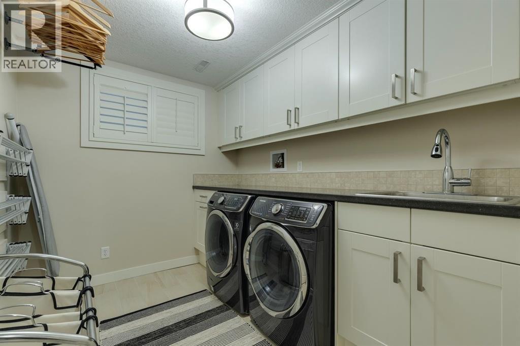 Single Family House for Sale in  Elmont Court SW Springbank Hill Calgary 