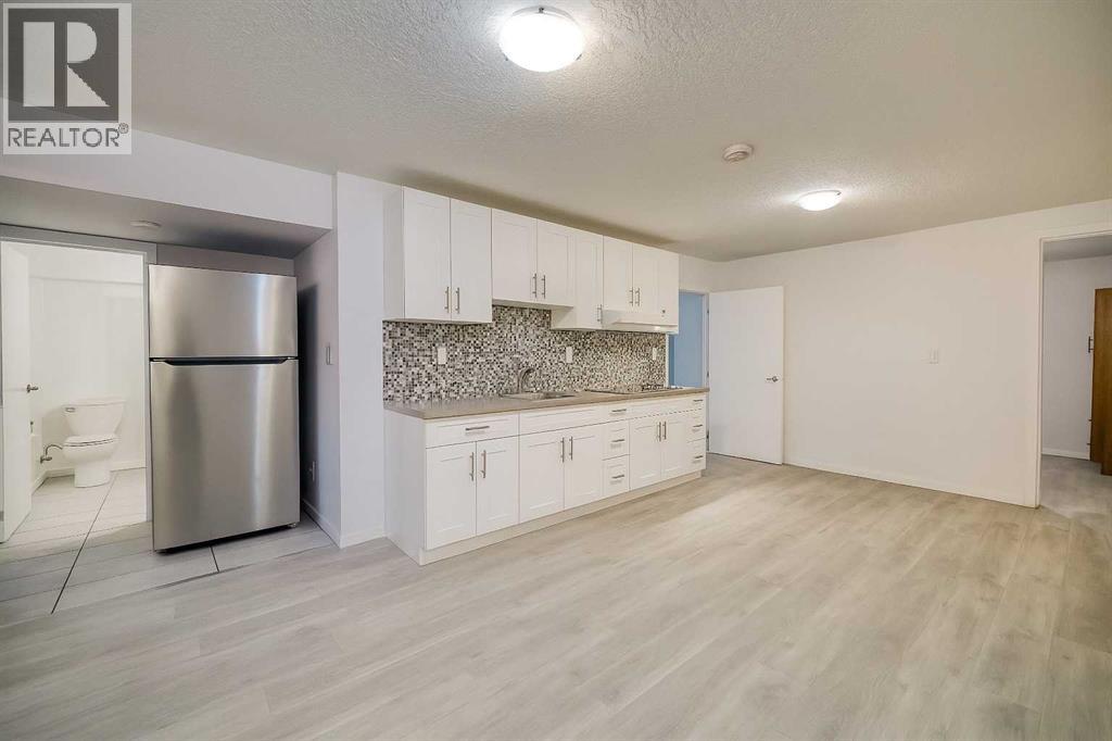 Single Family House Bungalow for Sale in  Boulton Road NW Brentwood Calgary 