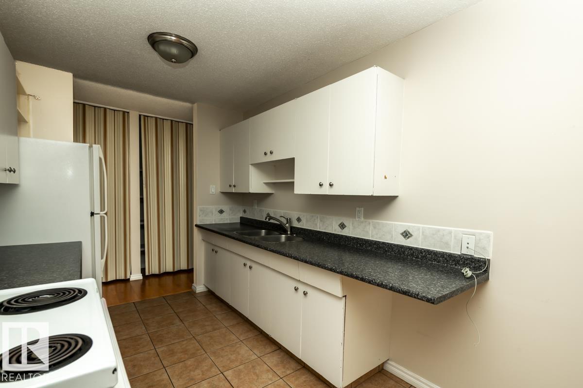 #301 7204 81 AV NW - 11