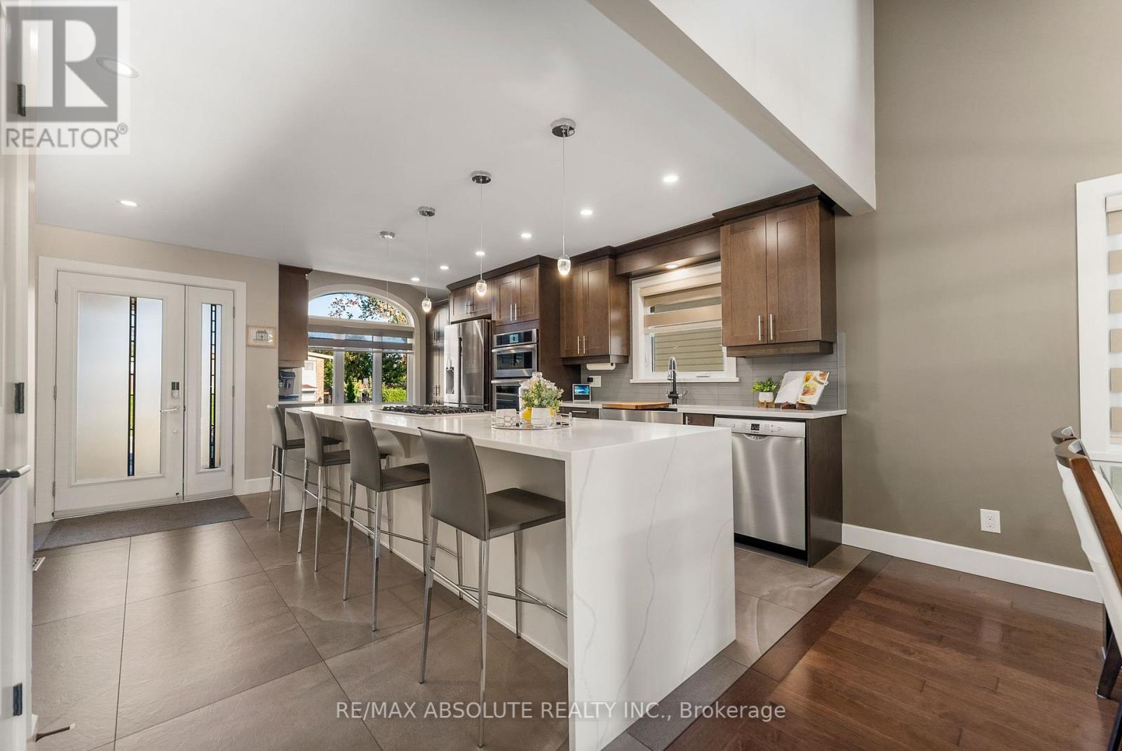 Gorgeous quartz island w/waterfall finish