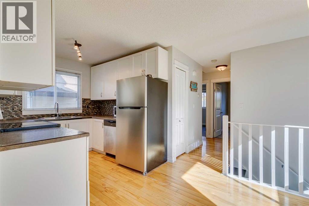 Single Family House Bi-level for Sale in  Sunbank Way SE Sundance Calgary 