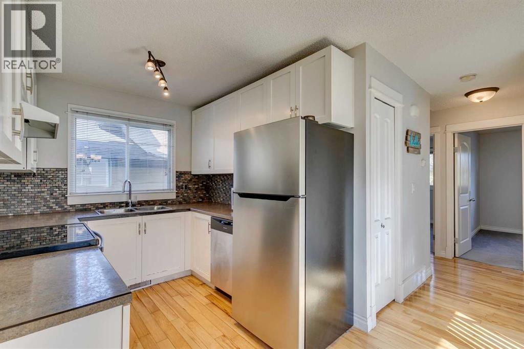 Single Family House Bi-level for Sale in  Sunbank Way SE Sundance Calgary 