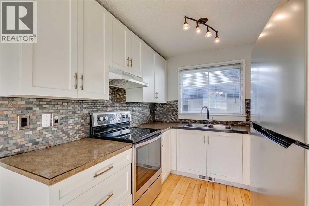 Single Family House Bi-level for Sale in  Sunbank Way SE Sundance Calgary 