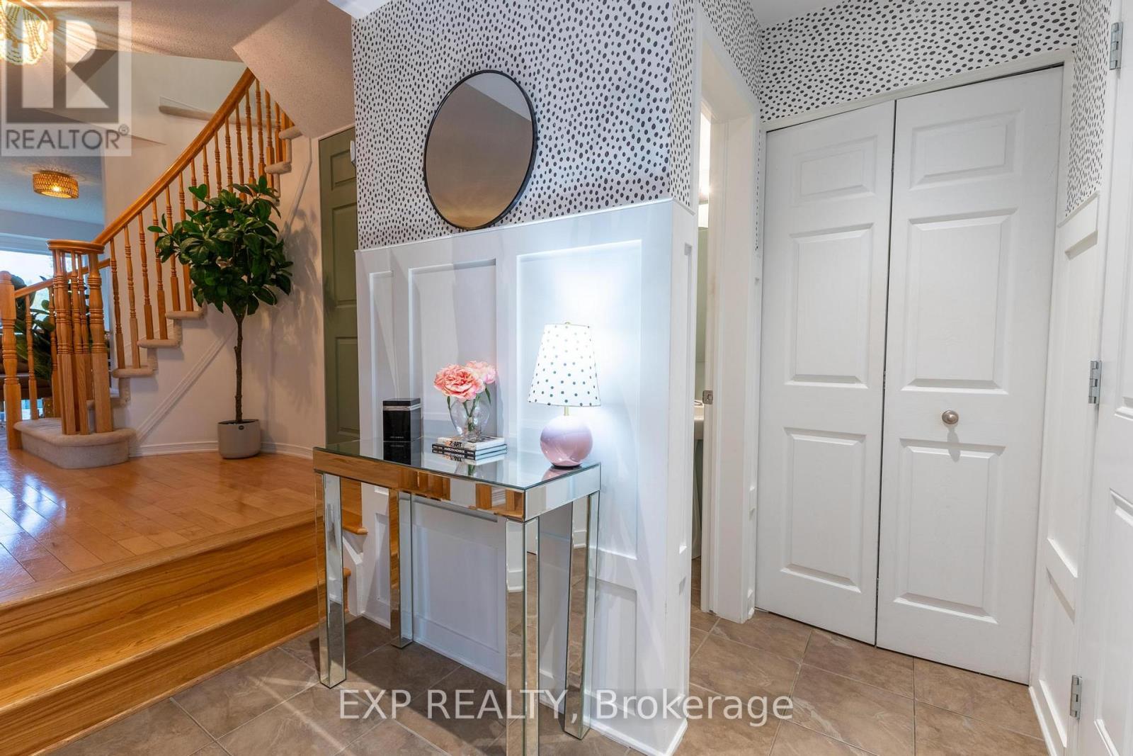 Foyer and two-piece bathroom