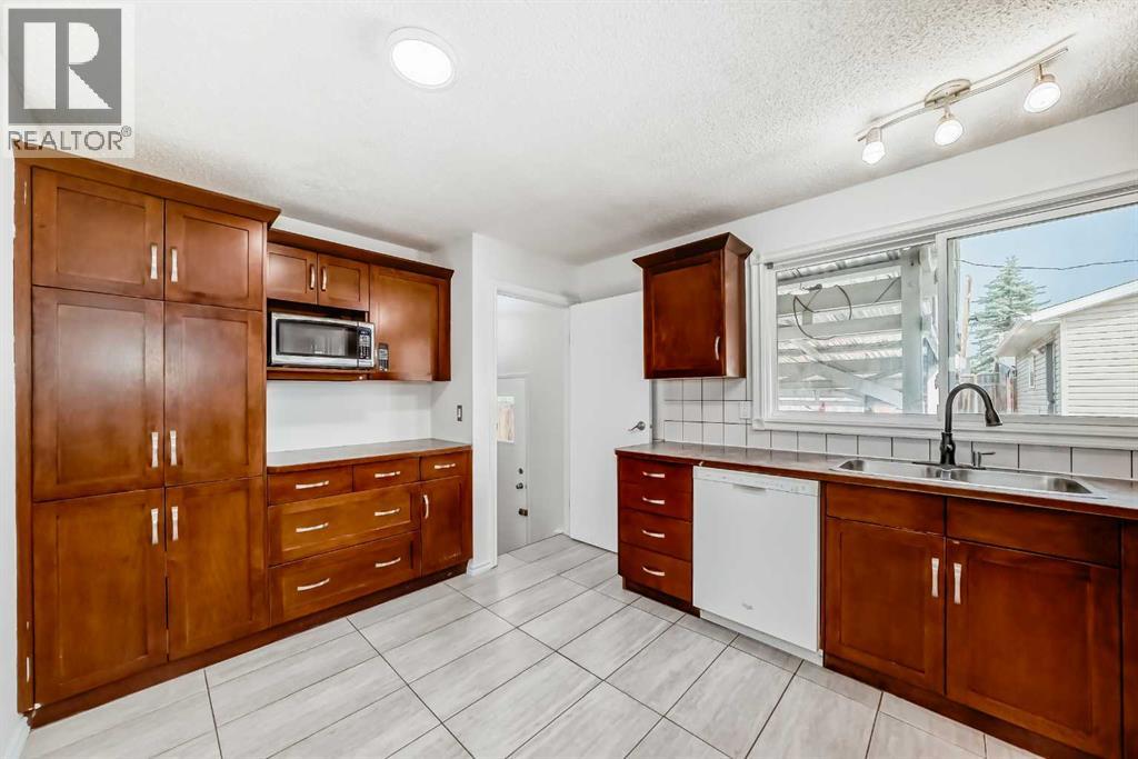 Single Family House Bungalow for Sale in  Pinecliff Way NE Pineridge Calgary 