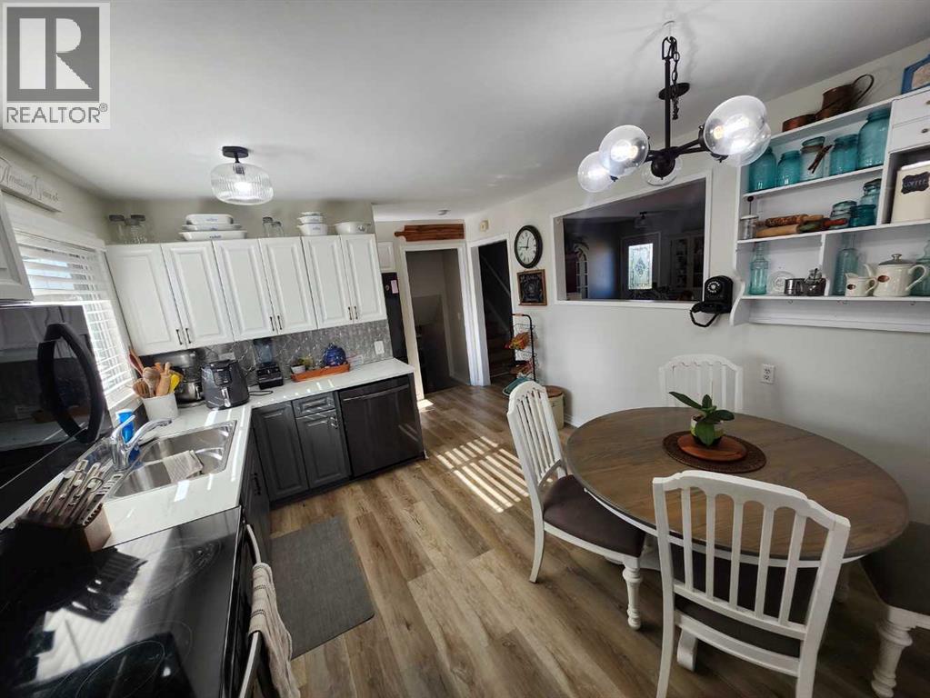 Single Family House 4 Level for Sale in  Addison Place SE Acadia Calgary 