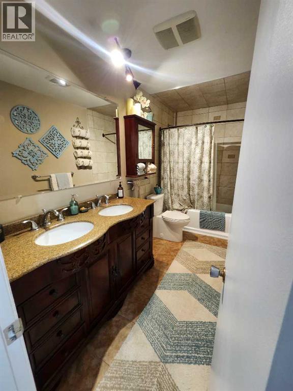 Single Family House 4 Level for Sale in  Addison Place SE Acadia Calgary 