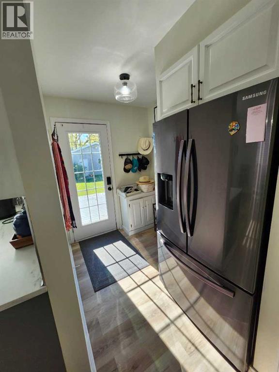 Single Family House 4 Level for Sale in  Addison Place SE Acadia Calgary 