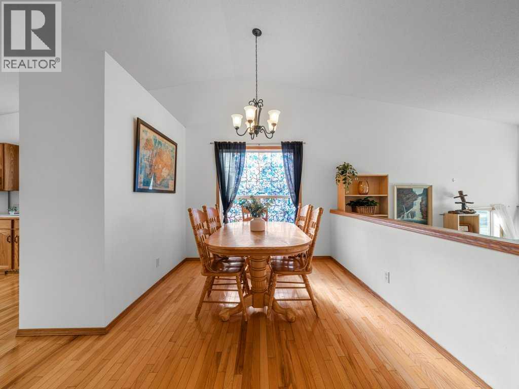 Single Family House Bi-level for Sale in  Arbour Stone Rise NW Arbour Lake Calgary 