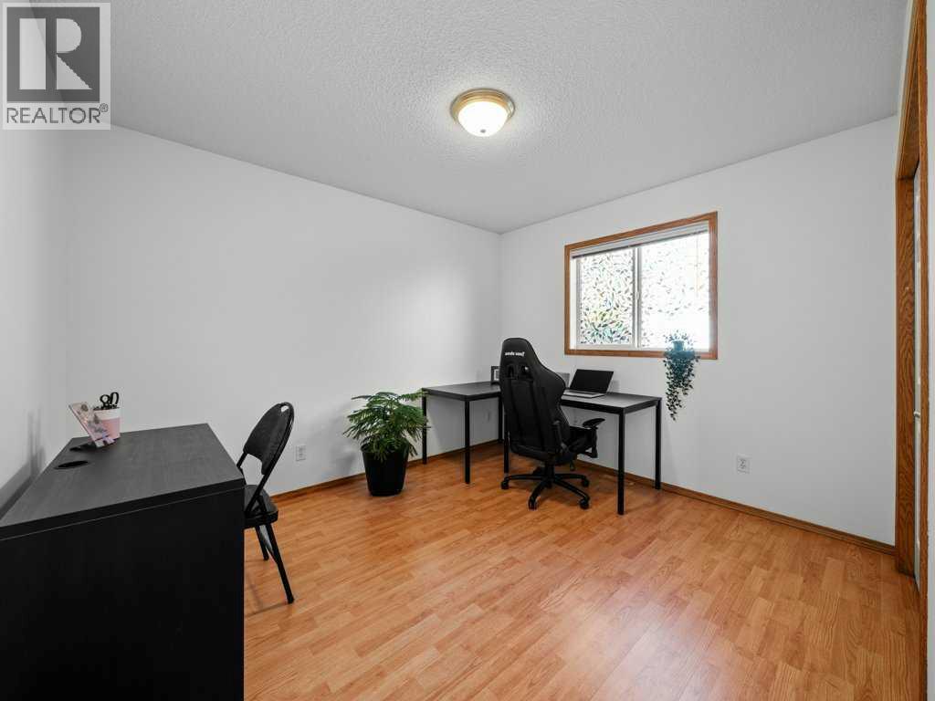 Single Family House Bi-level for Sale in  Arbour Stone Rise NW Arbour Lake Calgary 
