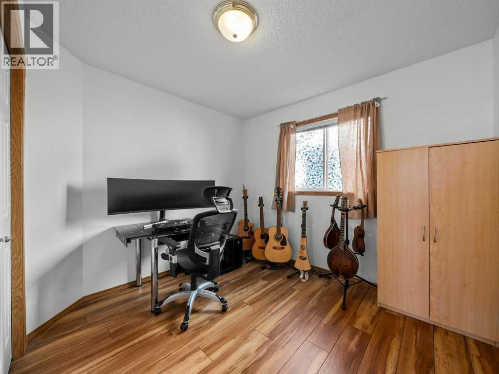 Single Family House Bi-level for Sale in  Arbour Stone Rise NW Arbour Lake Calgary 