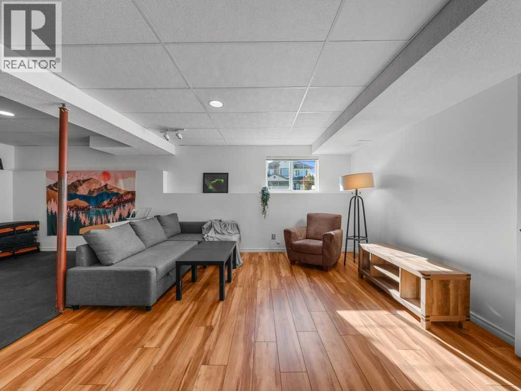 Single Family House Bi-level for Sale in  Arbour Stone Rise NW Arbour Lake Calgary 