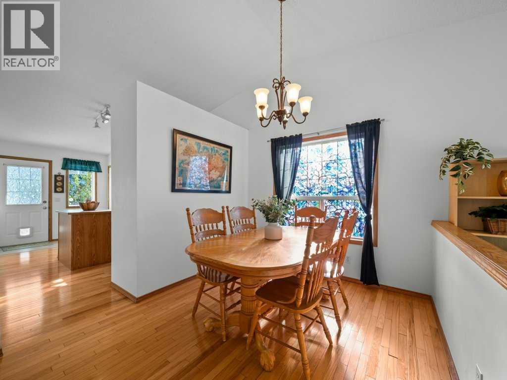 Single Family House Bi-level for Sale in  Arbour Stone Rise NW Arbour Lake Calgary 