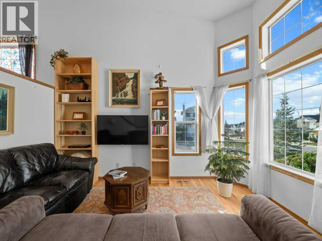 Single Family House Bi-level for Sale in  Arbour Stone Rise NW Arbour Lake Calgary 