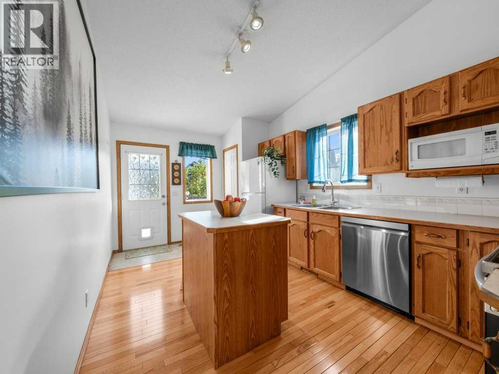 Single Family House Bi-level for Sale in  Arbour Stone Rise NW Arbour Lake Calgary 