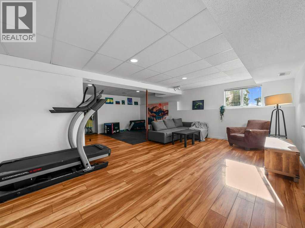 Single Family House Bi-level for Sale in  Arbour Stone Rise NW Arbour Lake Calgary 