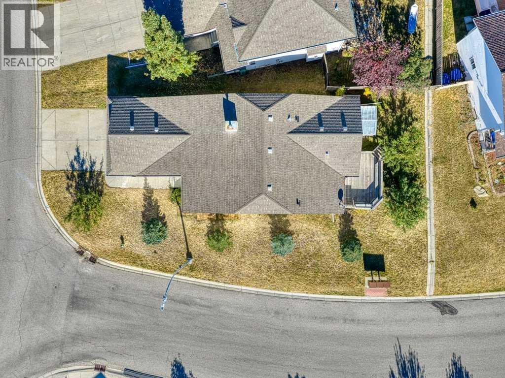 Single Family House Bi-level for Sale in  Arbour Stone Rise NW Arbour Lake Calgary 