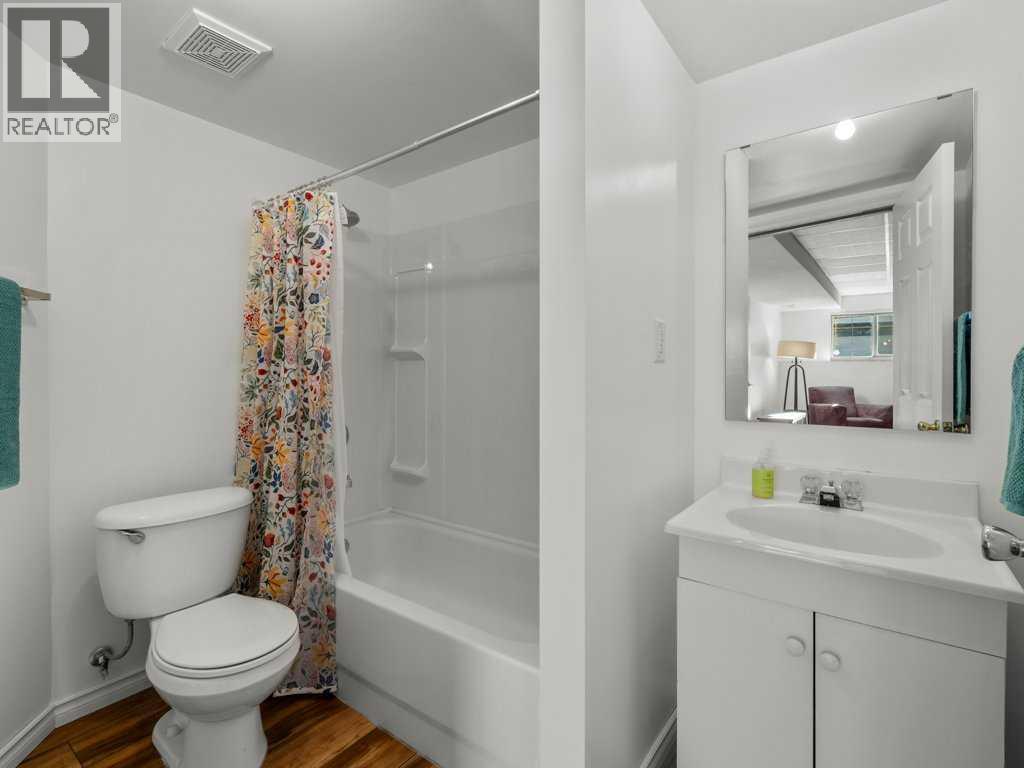 Single Family House Bi-level for Sale in  Arbour Stone Rise NW Arbour Lake Calgary 