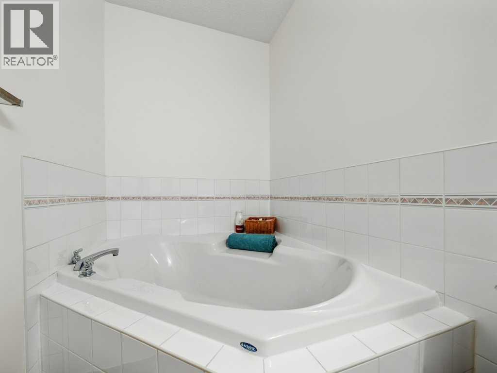Single Family House Bi-level for Sale in  Arbour Stone Rise NW Arbour Lake Calgary 