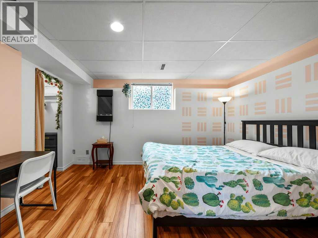 Single Family House Bi-level for Sale in  Arbour Stone Rise NW Arbour Lake Calgary 