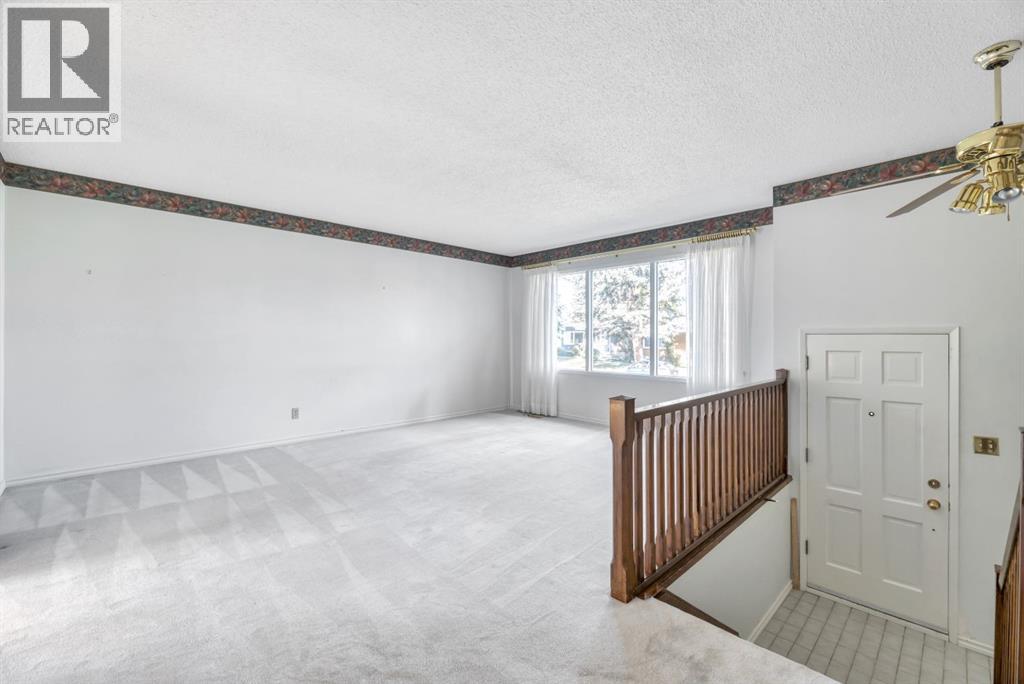 Single Family House Bi-level for Sale in  Brazeau Crescent SW Braeside Calgary 