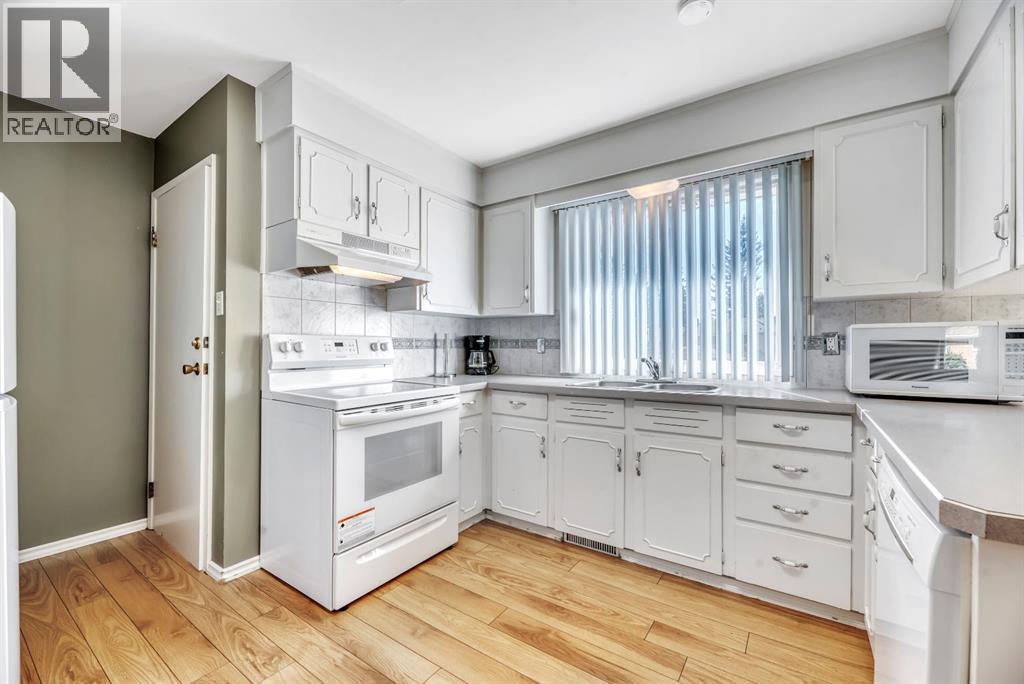 Single Family House Bi-level for Sale in  Brazeau Crescent SW Braeside Calgary 