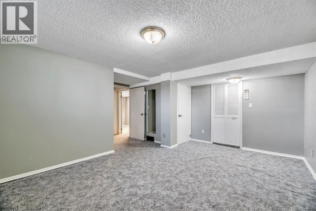 Single Family House Bi-level for Sale in  Brazeau Crescent SW Braeside Calgary 