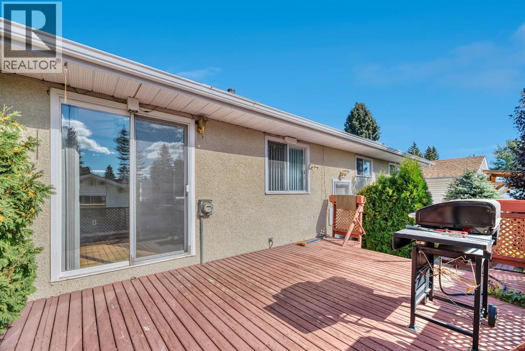 Single Family House Bi-level for Sale in  Brazeau Crescent SW Braeside Calgary 