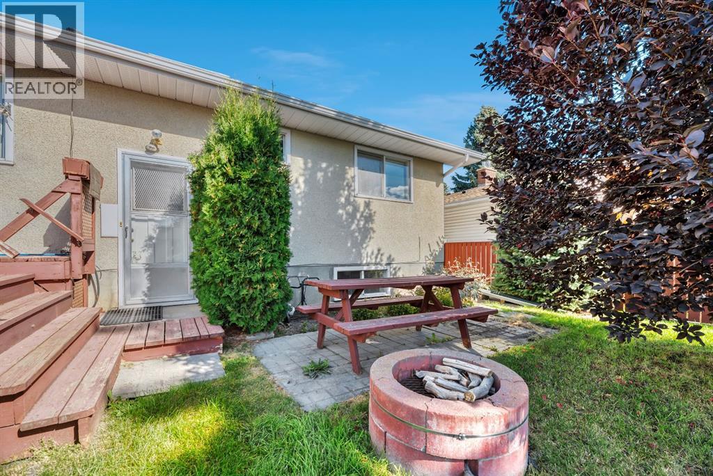 Single Family House Bi-level for Sale in  Brazeau Crescent SW Braeside Calgary 