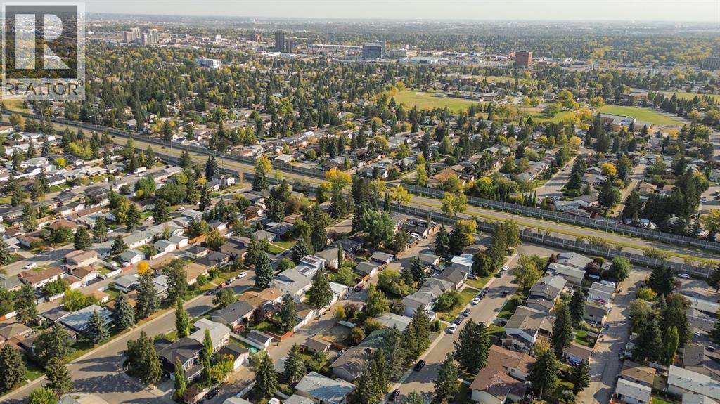 Single Family House Bi-level for Sale in  Brazeau Crescent SW Braeside Calgary 
