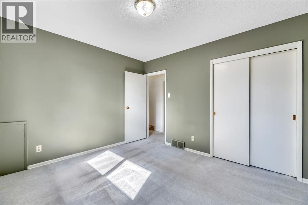 Single Family House Bi-level for Sale in  Brazeau Crescent SW Braeside Calgary 