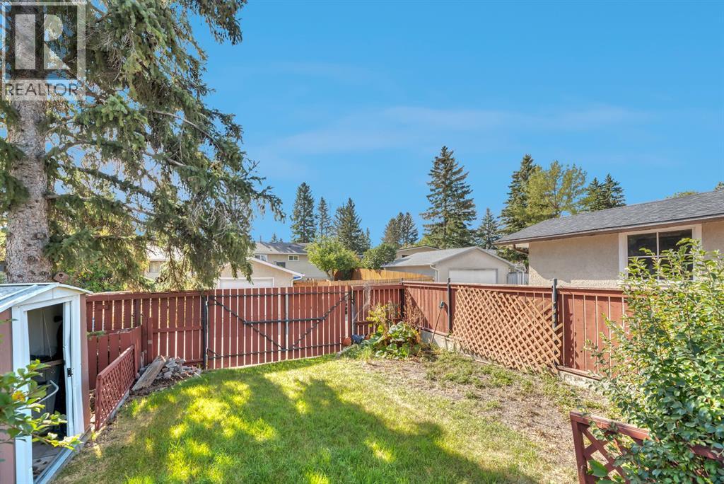 Single Family House Bi-level for Sale in  Brazeau Crescent SW Braeside Calgary 