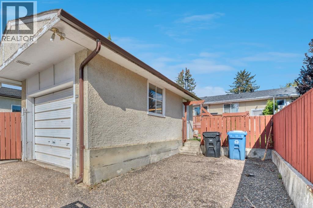 Single Family House Bi-level for Sale in  Brazeau Crescent SW Braeside Calgary 