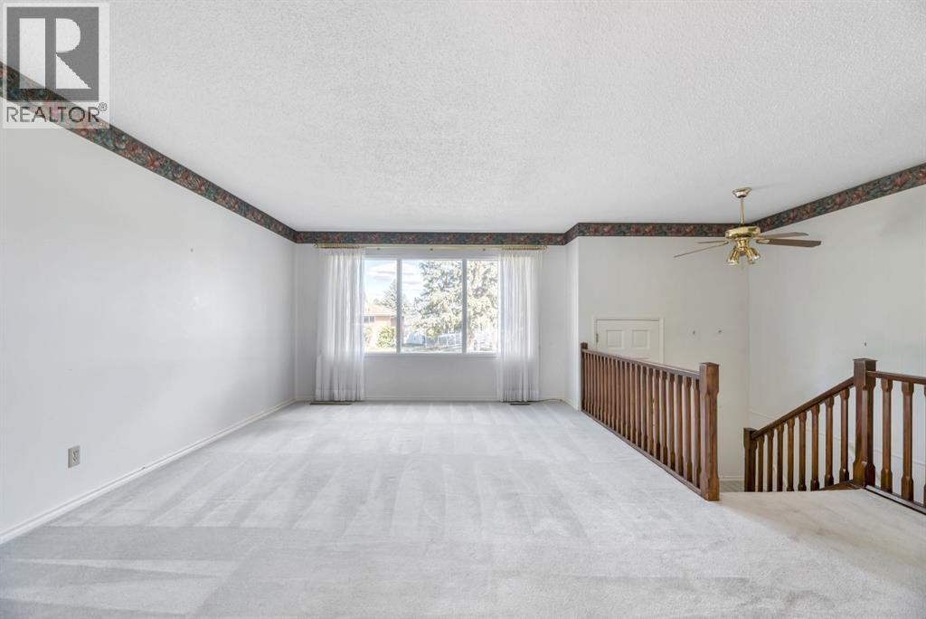 Single Family House Bi-level for Sale in  Brazeau Crescent SW Braeside Calgary 