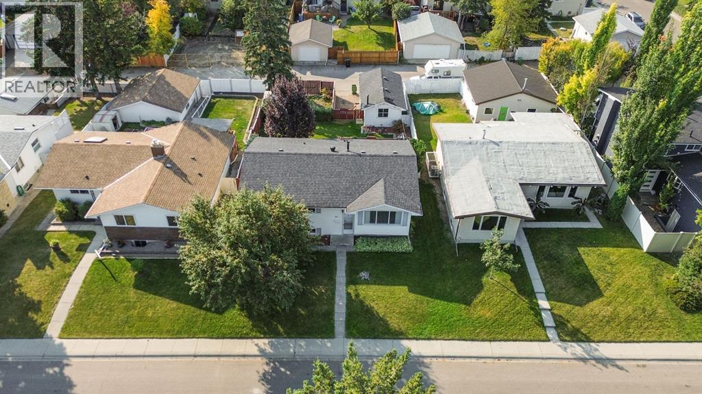 Single Family House Bi-level for Sale in  Brazeau Crescent SW Braeside Calgary 